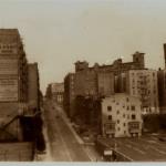 In the early 1930s, when this photograph was taken, garages lined the lower portion of 158th Street. Vestiges of the sign on the building at the left are still visible. 