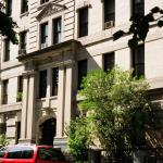 Designed by architects Neville and  Bagge, the Hortense Arms features a Palladian facade with a linkage between the doorway and windows above that give the illusion of a grand two-story entrance.