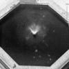 Close-up of previous 1913 photograph showing water in the fountain, but no statuary. The water source is apparently a spinkler nozzle of some sort in the center of the "pool."